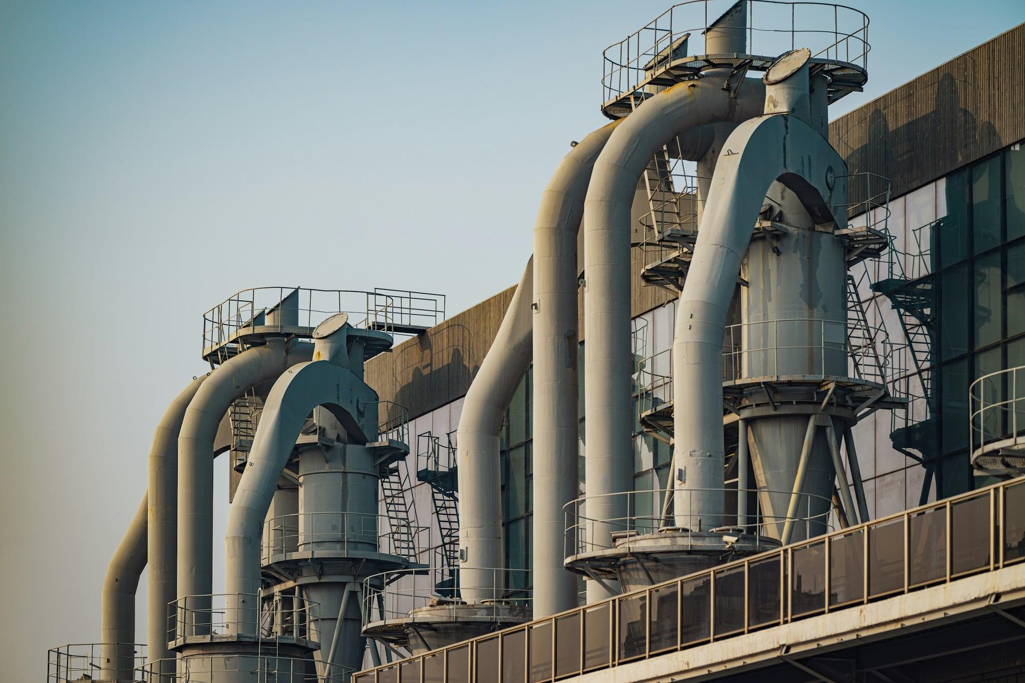 Modern agro-processing plant with external ducting and loading bays